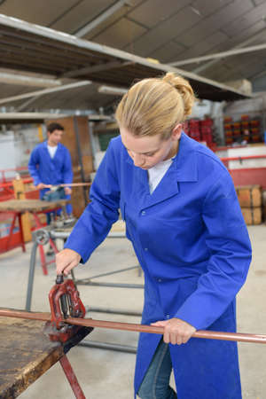 cutting a steel tubeの写真素材