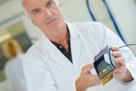 Worker holding card payment machine