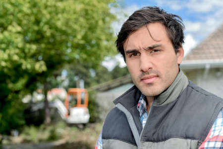 Foreman stood in a gardenの写真素材