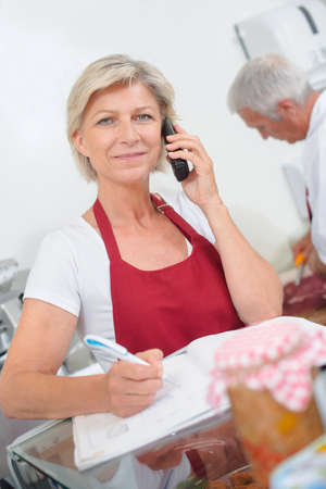 Butcher owner telephoneの写真素材