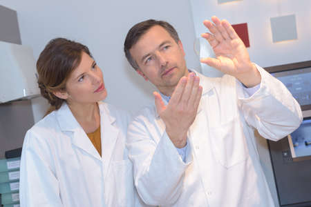 opticians working in the laboratoryの写真素材