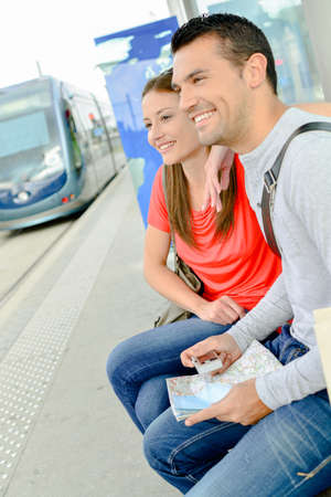 couple waiting for tramの写真素材