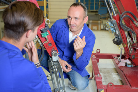 machinist with apprentice