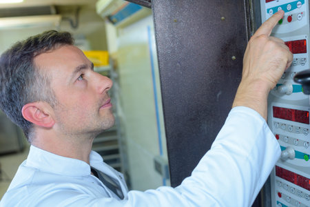 man pressing a machine
