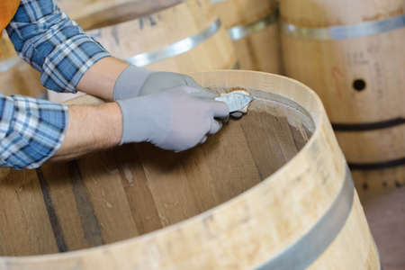 Cooper making wooden barrelの写真素材