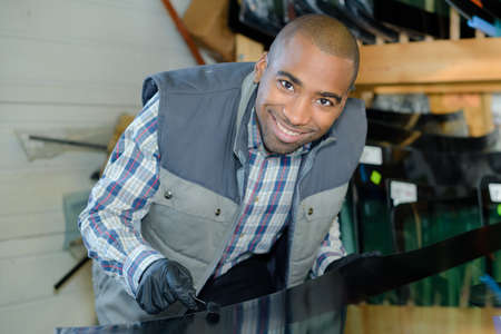 fixing the glass dentの写真素材