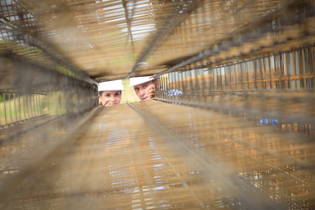 workers looking inside the product