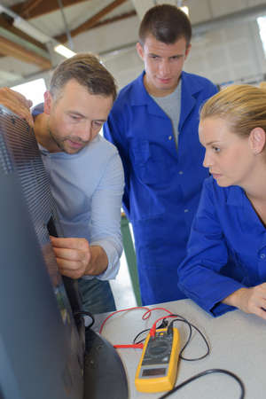 fixing a televisionの写真素材