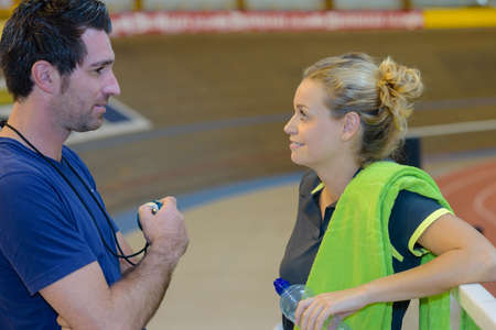 Sportswoman with coachの写真素材