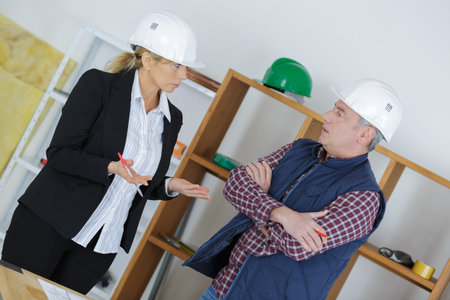 warehouse worker with manager in warehouse