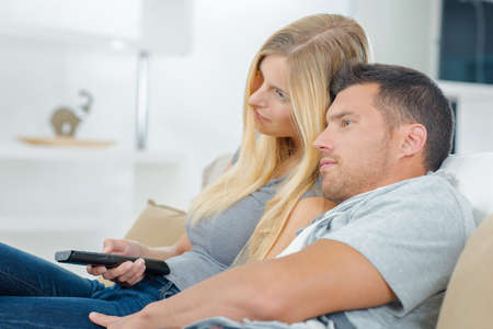 couple watching tvの写真素材
