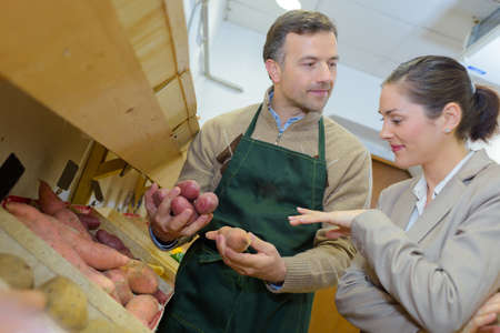 buying root cropsの写真素材