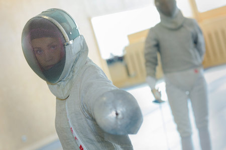 Woman in fencing posture