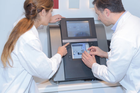 opticians working in the laboratory