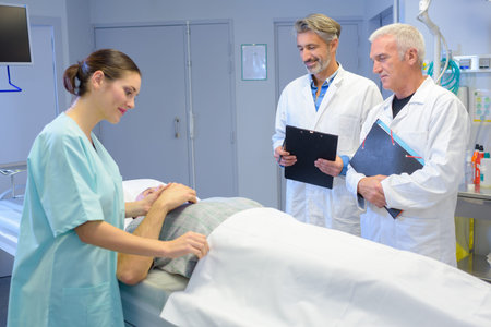 man lying on hospital bed