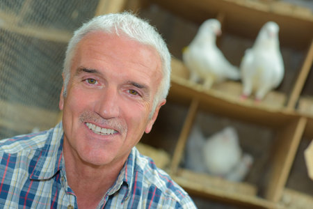 pigeon keeper smiling