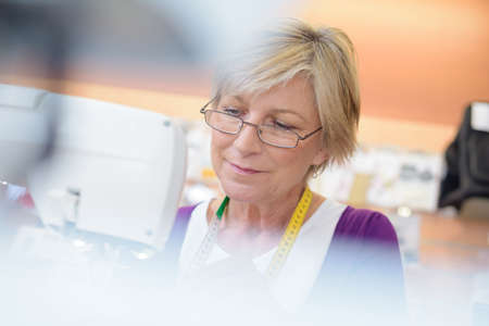 Senior seamstressの写真素材