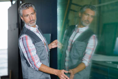 checking the glass qualityの写真素材