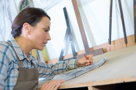 artist making a drawn pattern