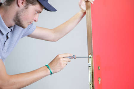 fixing the lockの写真素材