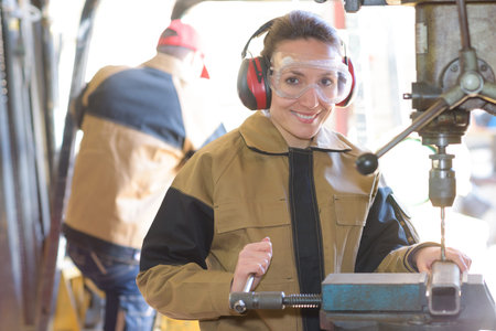 pretty employee milling at the factory