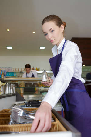 beautiful young friendly waitressの写真素材