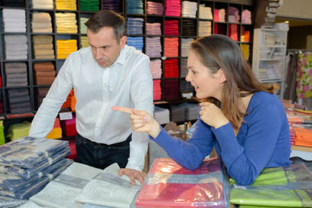 Couple in linen storeの写真素材