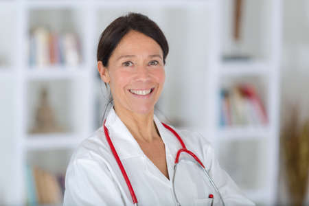 beautiful female doctor in white clothes the background hospitalの写真素材