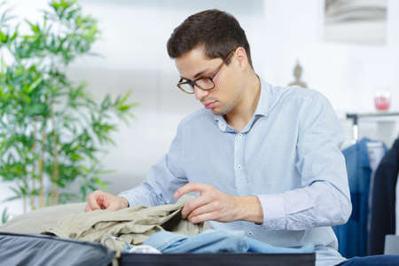 arranging the luggageの写真素材