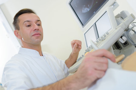 Doctor performing ultrasound
