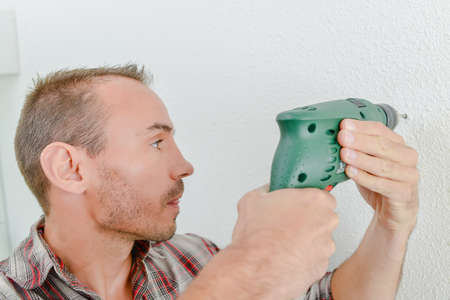 Man using a cordless drillの写真素材