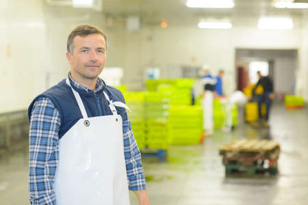 Portrait of man in factoryの写真素材