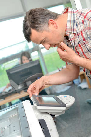 man with photocopierの写真素材