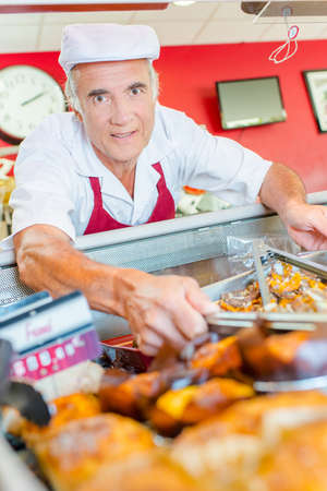 butcher at counterの写真素材