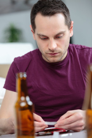Man rolling a cigarette