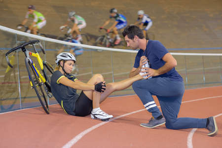 Physiotherapist with cyclistの写真素材