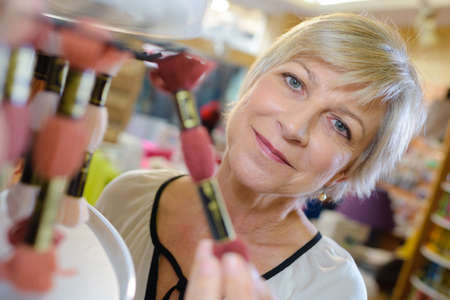 woman in haberdashery storeの写真素材