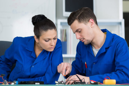 students in electronics class at university