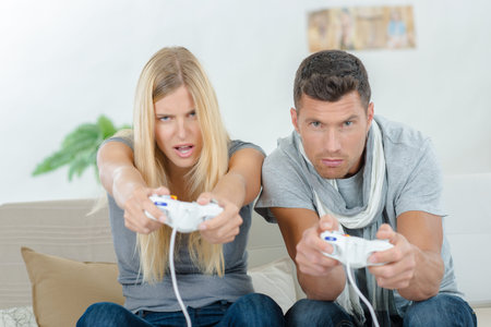 Couple playing computer game