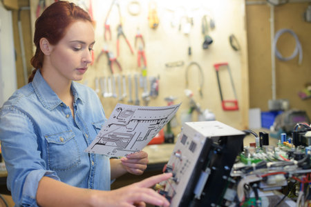 female working at table in workshop
