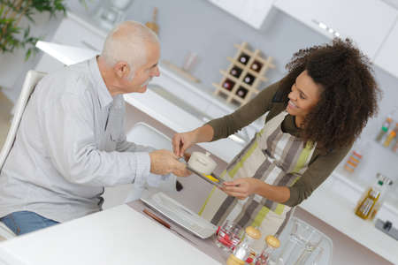 old man is spending time with his nurseの写真素材