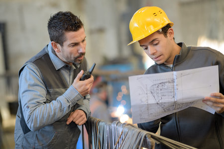 manager with storeman controlling goods deliveryの写真素材