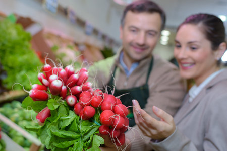 Closeup of radishes in greengrocer storeの写真素材