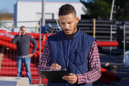 petroleum factory workers working outdoors
