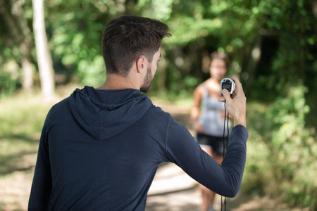 runner with stopwatch