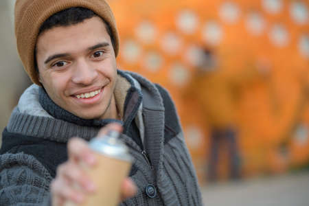 graffiti artist ready to draws on the wallの写真素材