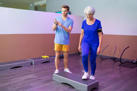 woman doing step exercisesの写真素材