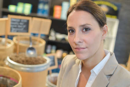 Portrait of woman in wholesale storeの写真素材