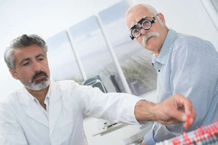 Senior man having his eyes testedの写真素材