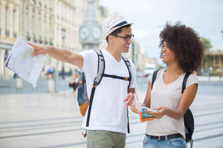 view of a couple of young attractive touristsの写真素材